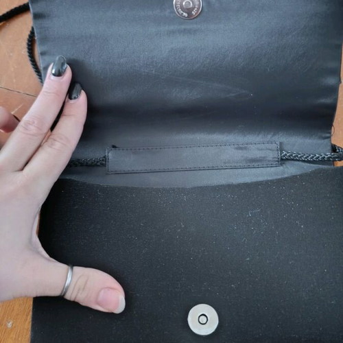 Shoulder bag like new, black with cord and button