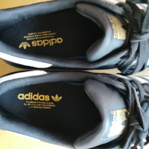 Adidas Superstar sneakers size 52.5, black and gold