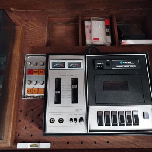 Handmade console with used acoustic equipment