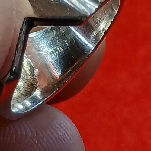 Silver ring with geometric design used
