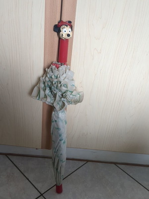 Lacoste vintage umbrella used with collectible Minnie Mouse
