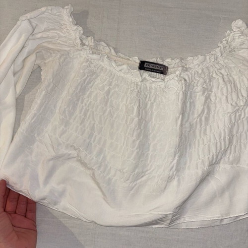 White blouse with ruffles and long sleeves like new
