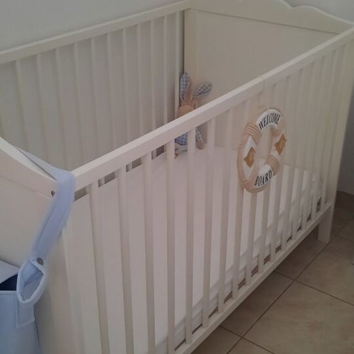 IKEA Baby Cot like new with mattress and sheets