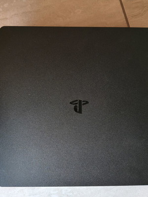 PS4 Slim 1TB console used with 3 games and 1 controller