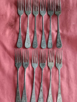 Vintage collectible forks set of 12 used with designs