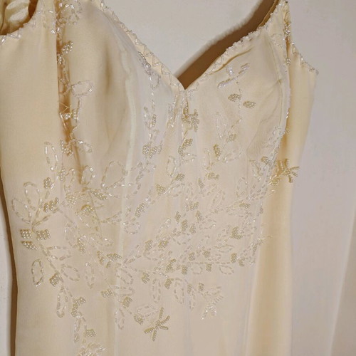 Maxi dress in butter yellow color with straps and embroidery