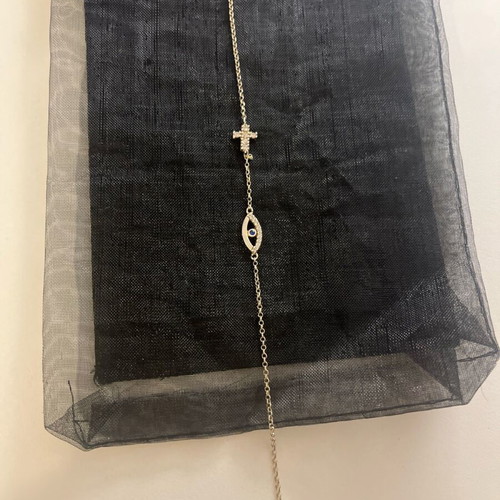 Silver delicate bracelet with cross and eye like new