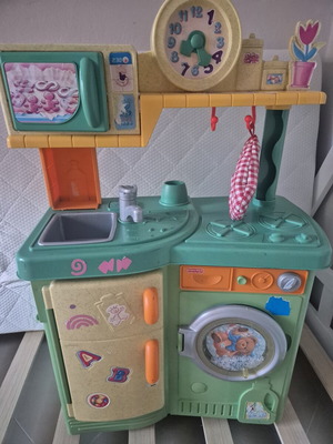 Fisher Price children's play kitchen with microwave and washing machine