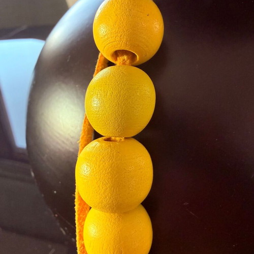 Handmade yellow necklace with wooden beads and suede cord like new