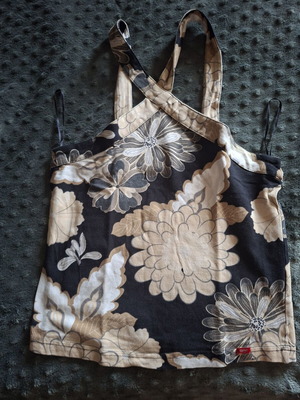 Floral women's top small size like new, black and beige