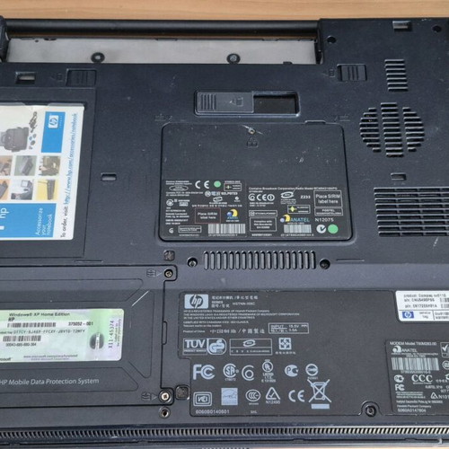 HP Compaq NX6110 laptop used without hard drive, battery, and charger