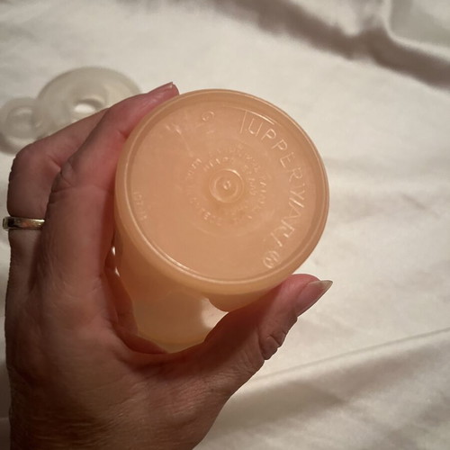 Tupperware shaker new, salmon color with double opening lid