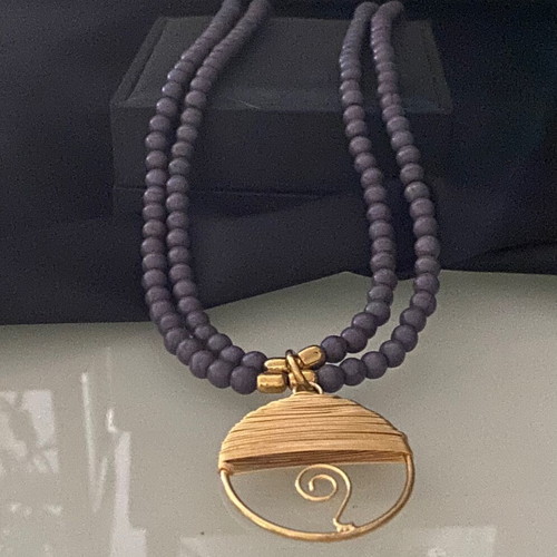 Handmade necklace new with semi-precious haolite stones and steel motif