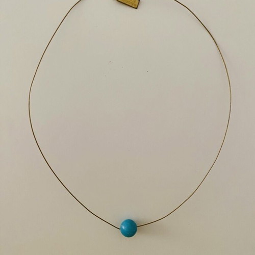Necklace with blue turquoise bead used
