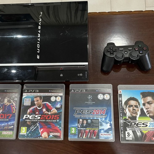 PlayStation 3 console 500GB with controller and 4 games