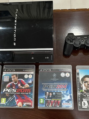 PlayStation 3 console 500GB with controller and 4 games