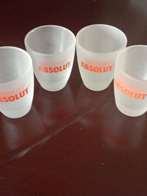 Absolut shot glasses like new, set of 4