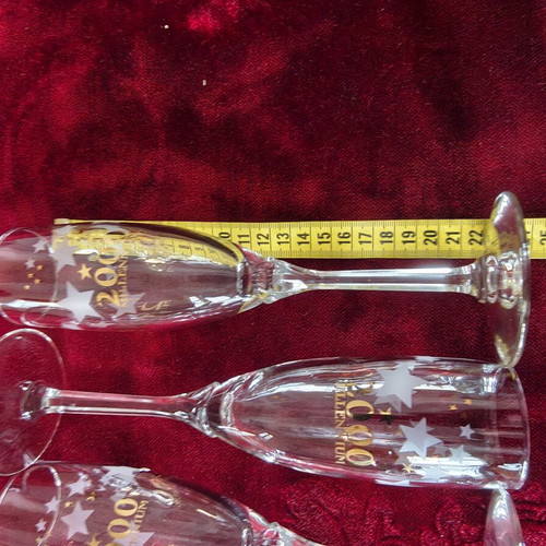 Millennium 2000 champagne glasses set of 4, collectible