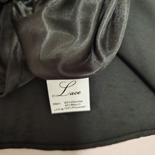 Black mini dress used with open back and bell sleeves, size S