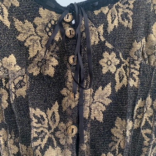 Top M Ake' black and gold used with lace detail