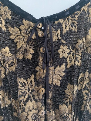 Top M Ake' black and gold used with lace detail