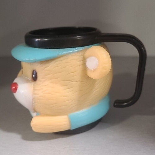 Vintage children's mug with teddy bear collectible