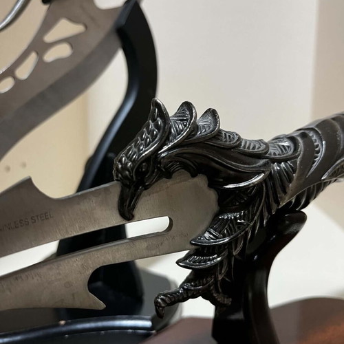Decorative knife set with ornate handles