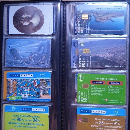 Phone cards like new, set of 48 in album 1