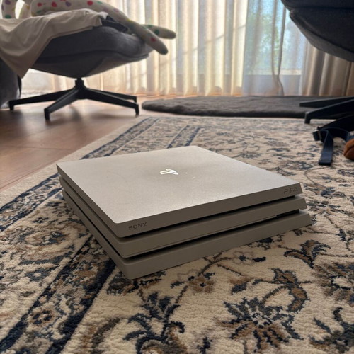 PlayStation 4 Pro Destiny Edition console with two controllers