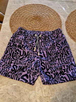 Marks & Spencer children's swim shorts like new, purple, size 6-7 years