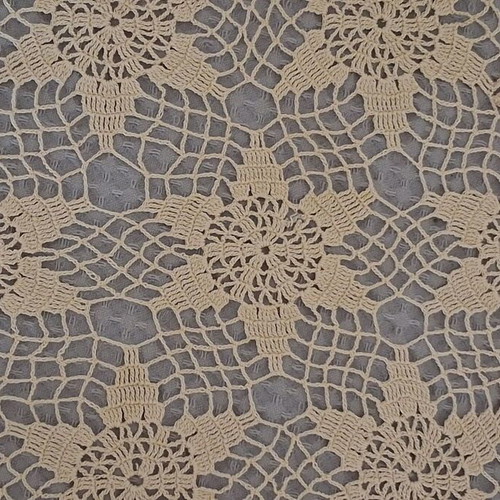 Round beige doily used, diameter 29 cm