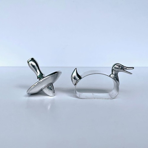 Set of 2 silver decorative items 900 & 925 used, duck and spinning top