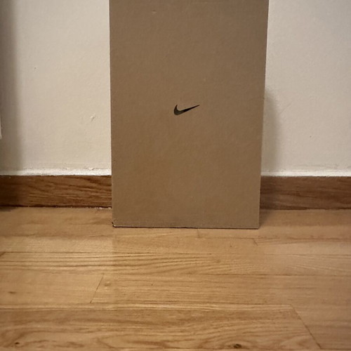 Nike men's white Calm slides size 42.5, used with signs of wear