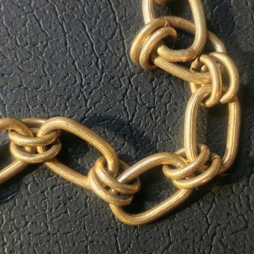 Long steel necklace chain like new, gold tone