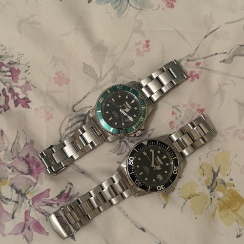 Invicta wristwatches, 2 pieces, green quartz and black automatic