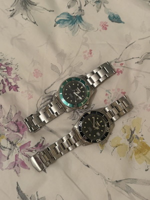 Invicta wristwatches, 2 pieces, green quartz and black automatic