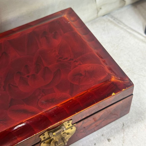 Vintage wooden jewelry box used with red satin lining