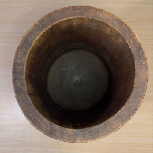 Rustic handmade wooden mortar used