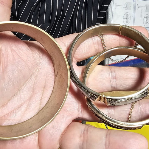 Vintage women's bracelet set used, one missing a stone