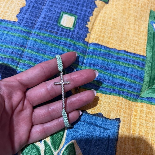 Cross bracelet like new with adjustable cord
