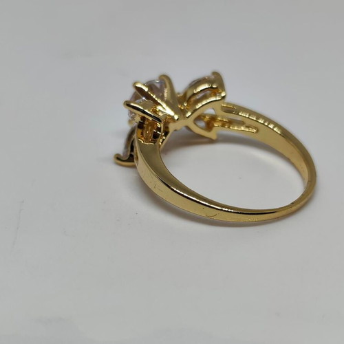Elegant women's ring with central crystal and decorative petals, like new