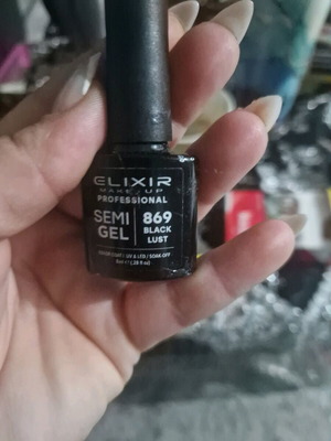 Semi-permanent nail polish black like new
