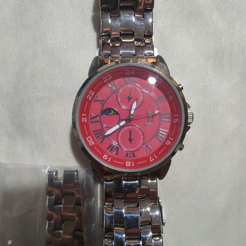 Königswerk men's multifunction watch with red dial and steel bracelet