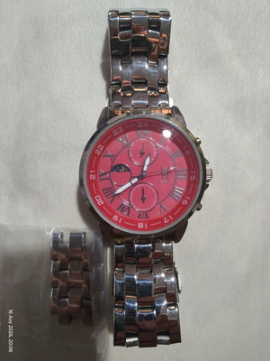 Königswerk men's multifunction watch with red dial and steel bracelet