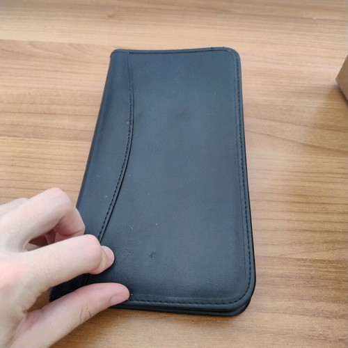 Card holder with four sleeves used