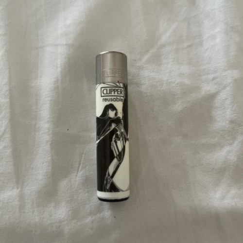 Clipper X Ray 2/4 lighter used, empty for collectible use