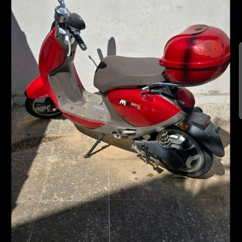 Red electric scooter for repair or spare parts