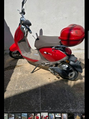 Red electric scooter for repair or spare parts