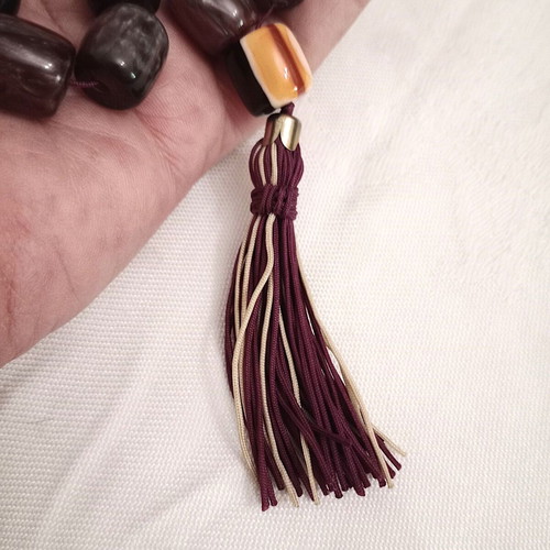 Worry beads with synthetic resin beads in purple color like new