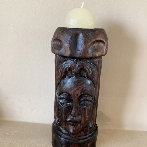 Wooden carved candlestick with embossed decoration